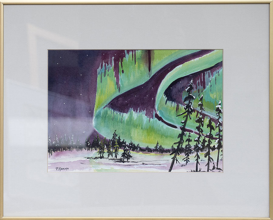 A framed watercolour painting of vibrant northern lights at night behind a snowy forest.
